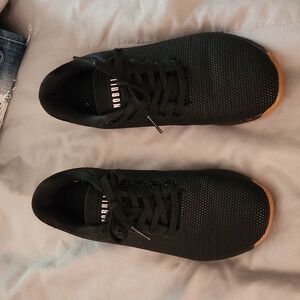 Genty used size 9 gum bottom Nobull trainers.